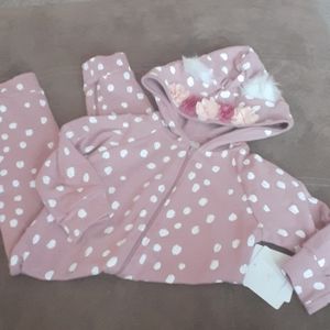 Rosie pope baby one piece.